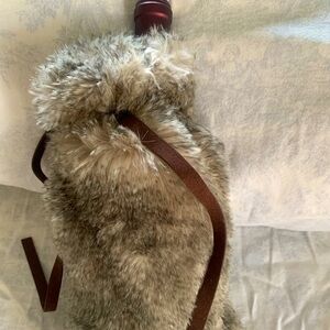 Pottery Barn furry wine bottle holders